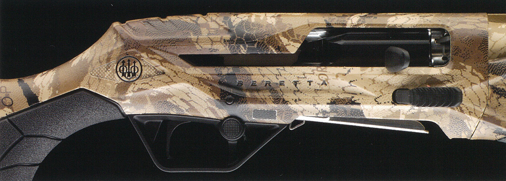 Optifade Marsh – f-range 東京表参道の銃砲店 Side view of a camouflage hunting rifle with a black stock and visible Beretta branding.