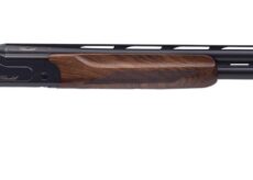 Double-barreled hunting shotgun with a polished walnut stock and checkered grip.