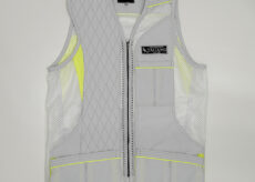Gray high-visibility safety vest with neon-yellow accents, mesh panels, and multiple pockets along the front zipper area.