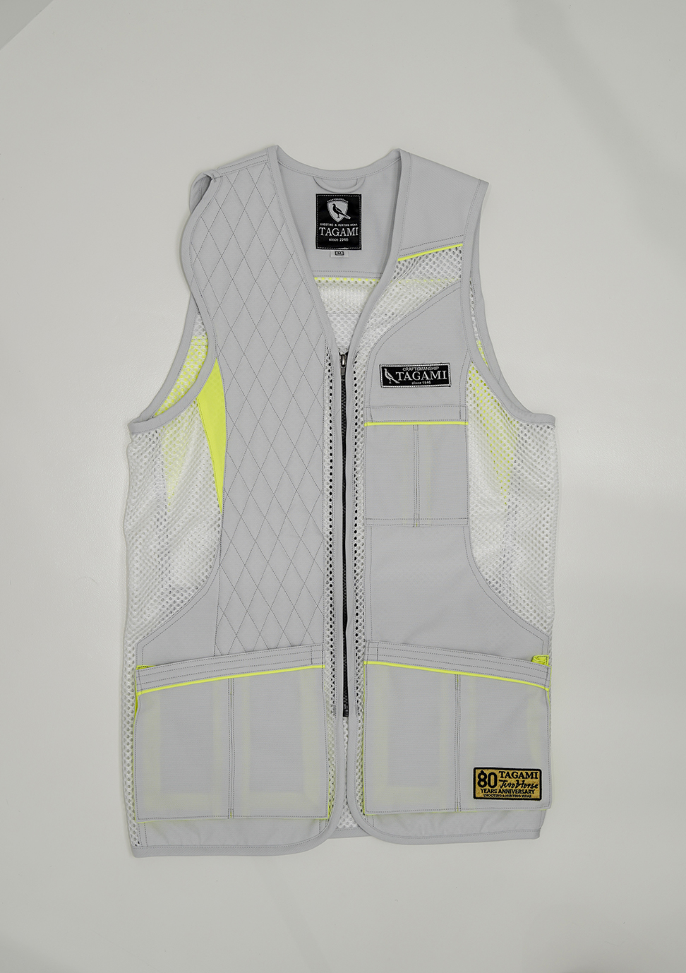 DSC08269_low – f-range 東京表参道の銃砲店 Gray high-visibility safety vest with neon-yellow accents, mesh panels, and multiple pockets along the front zipper area.